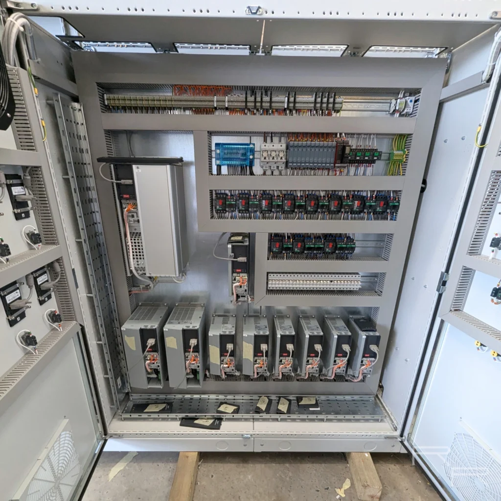 Open starter and VSD section with contactors, motor protection breakers and Danfoss drives wired to terminal rails