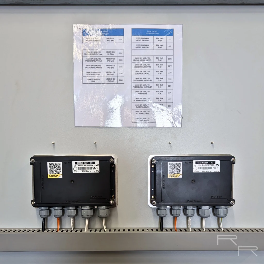 Two weigh transmitters mounted inside the control section, serving the metering feeders
