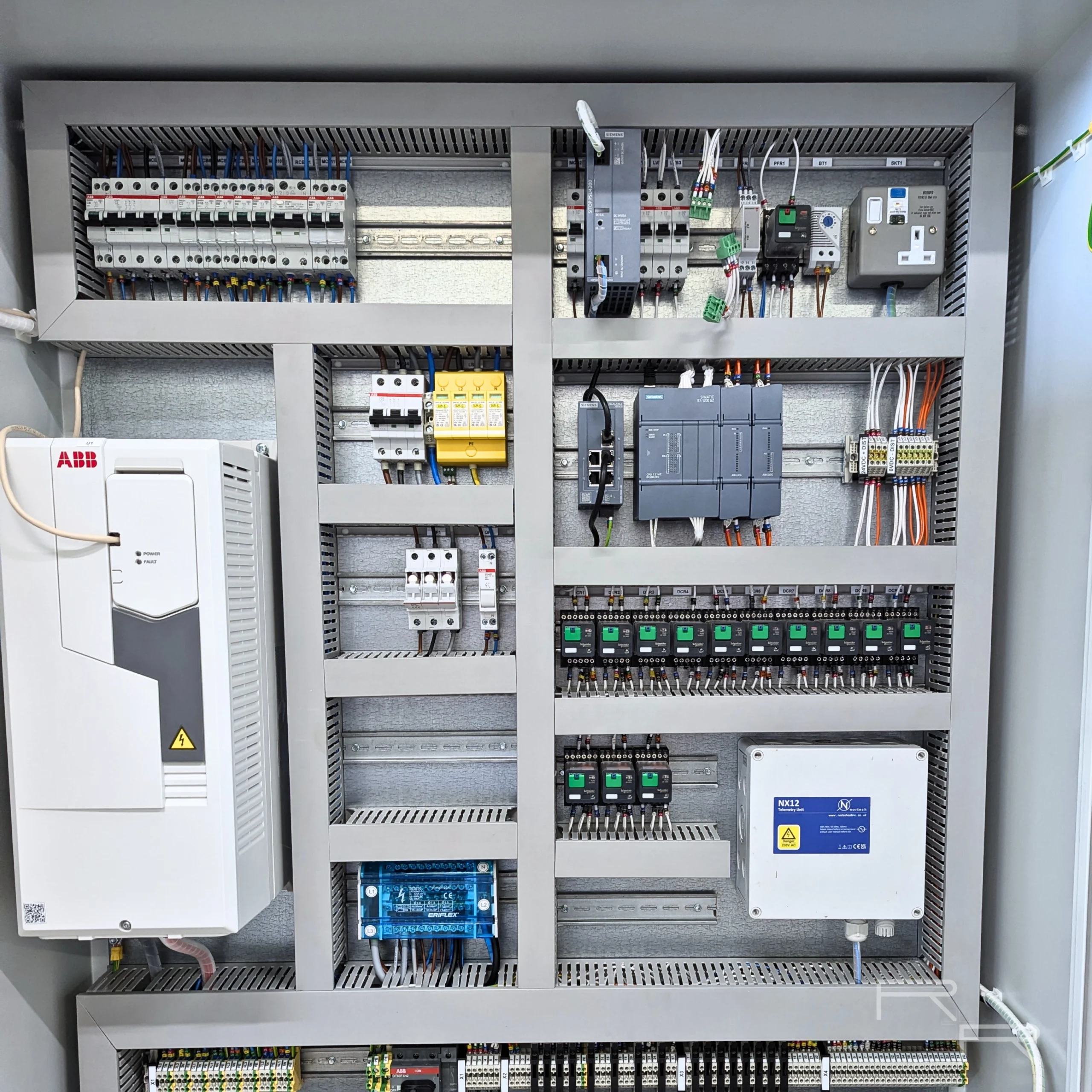 Full internal layout of the nanobubble control panel showing ABB ACS580 VSD, MCB distribution, Siemens PLC and relay bank